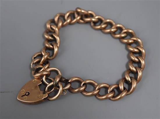 A 9ct. gold curblink bracelet.